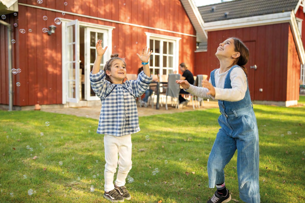 Children playing outside a Lalandia holiday house